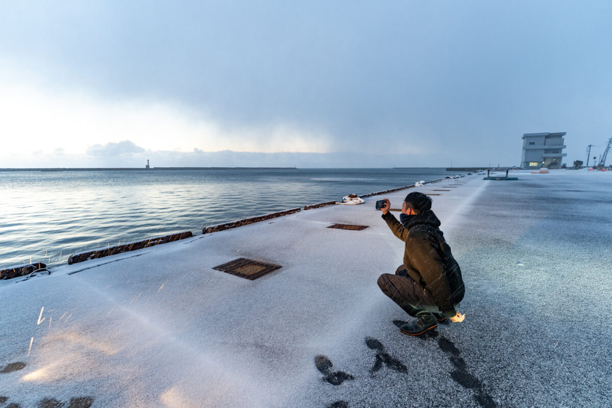 競り場へ向かう途中、お気に入りの場所で写真を撮るのが習慣